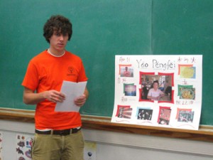 a male student addresses the class
