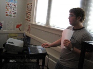 a student makes a presentation to the class
